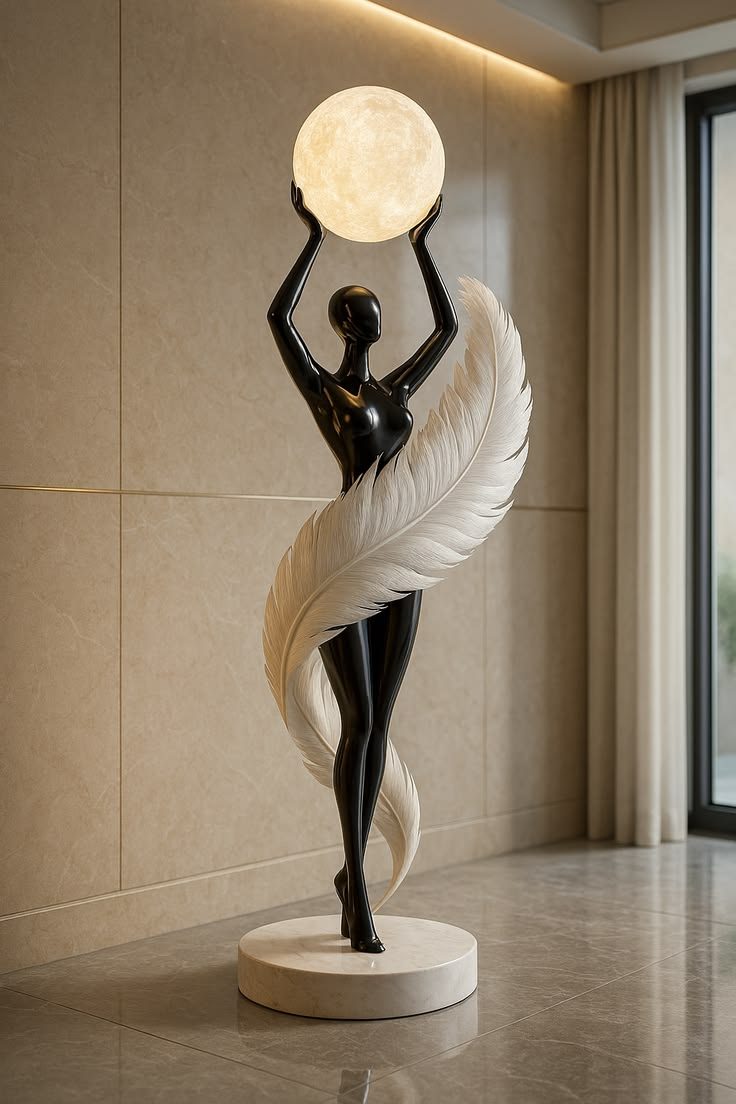 Winged Moon Figure